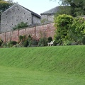 Hot border and old barn Sizergh Castle